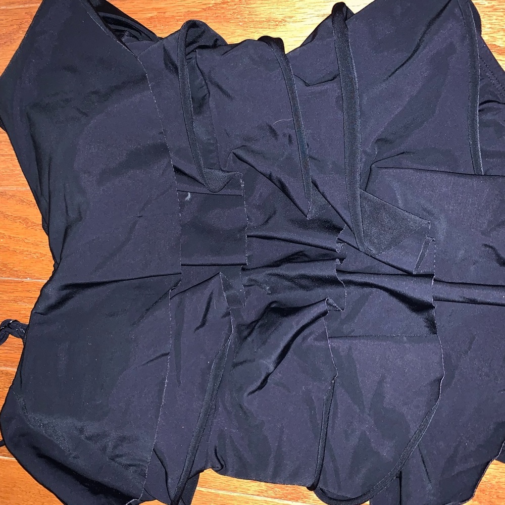 black ruffled one piece